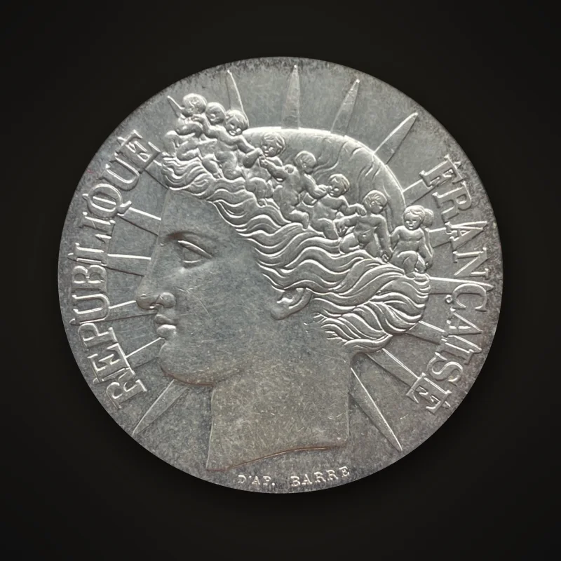100 francs argent Fraternité 1988, avers : tête de la Liberté devant des rayons