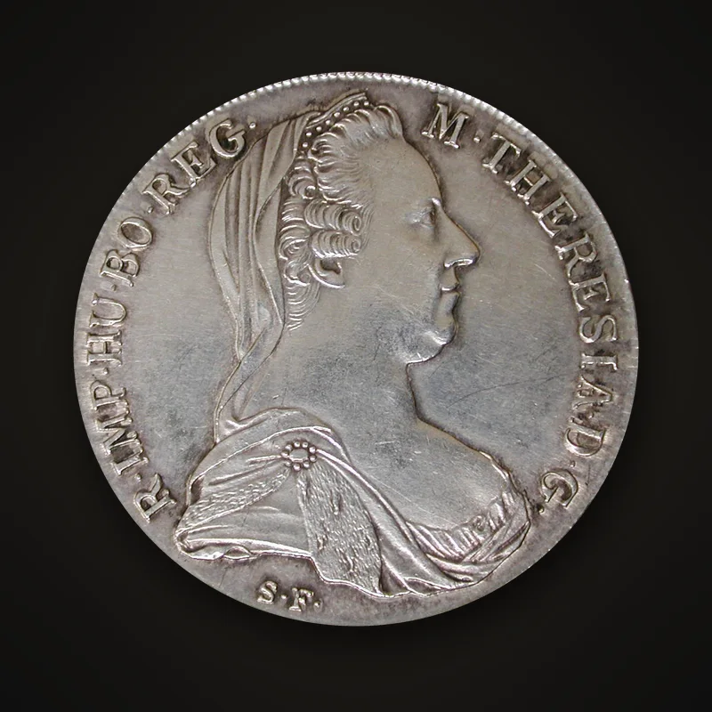 Thaler de Marie-Thérèse, avers : buste voilé de l’impératrice à droite